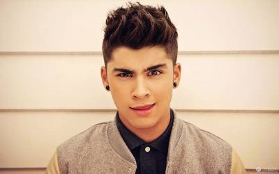 One Direction 成員 Zayn Malik 在Twitter 上公佈了新髮型照後 女歌迷用「#殺了我吧」分享了他的自拍照